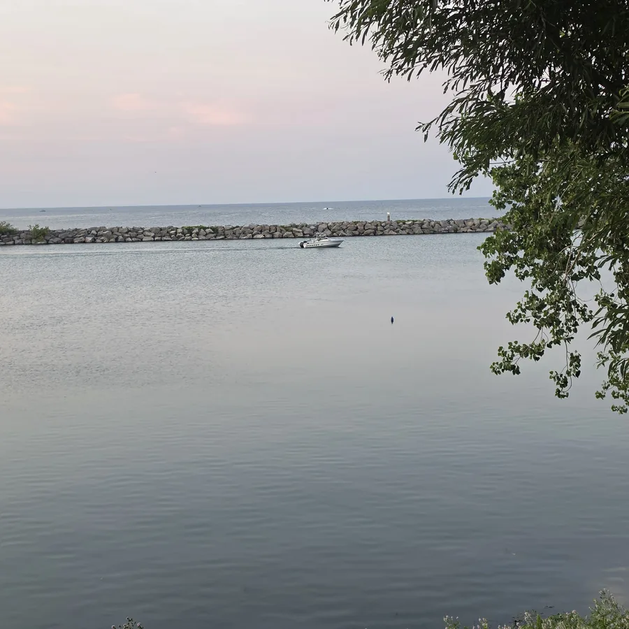 Ontario harbour with a breakwall and calm evening water